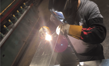 steel-fabricator-working-with-metal